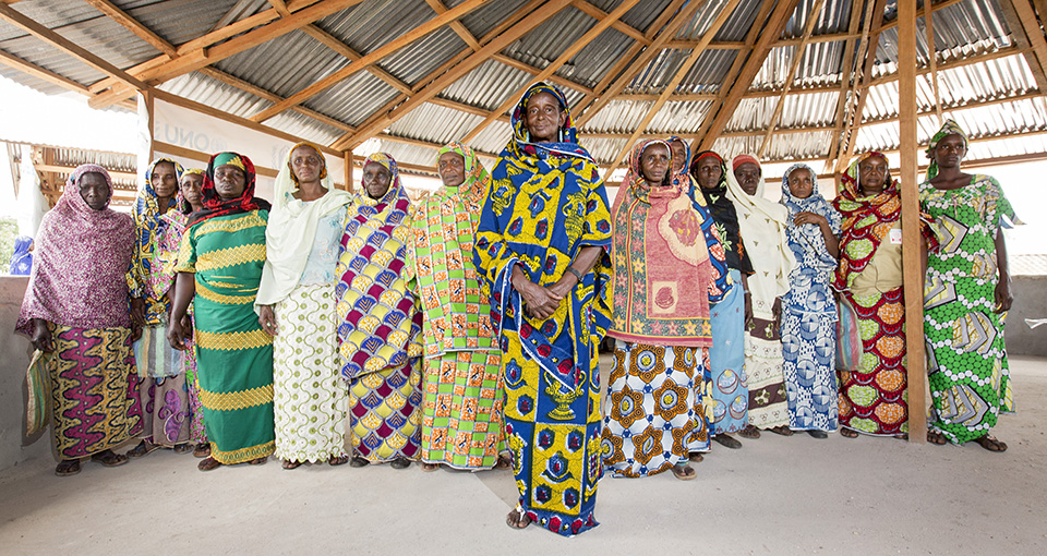 Ardo Djibo Fadimatou (centre, in blue and yellow), 64, lost eight of her 15 children during the conflict in CAR. Photo: UN Women/Ryan Brown