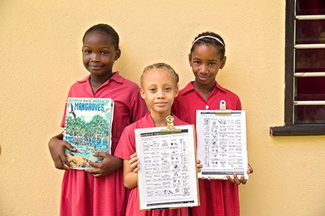 Members of aWildlife Club of 8-year-old children on an outing to learn about mangroves. Photo: UN Women/Ryan Brown