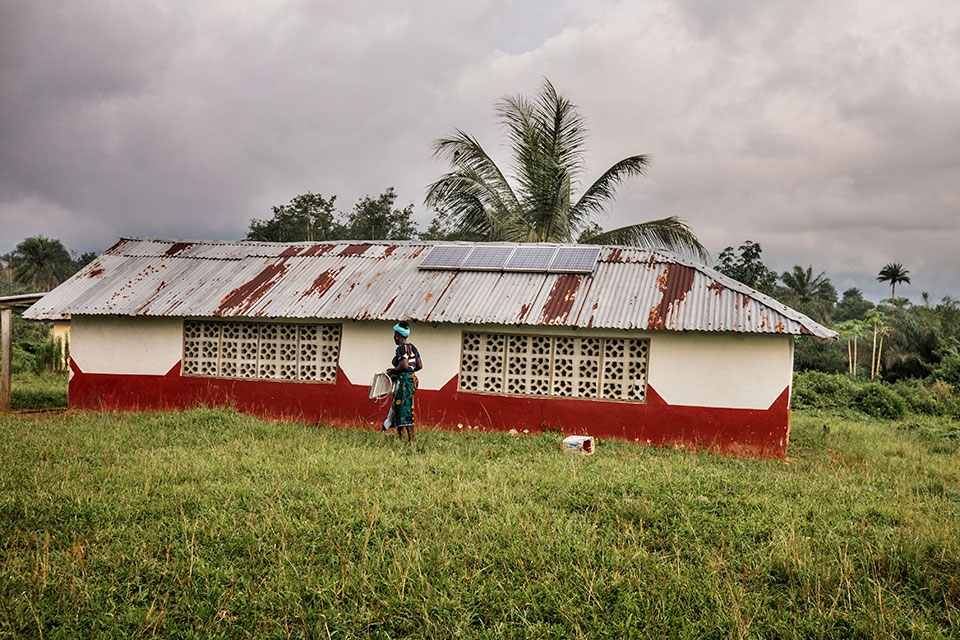 Built with support from UN Women, this Peace Hut in the village of Todee also serves as a workshop space and warehouse for the women solar engineers. Photo: Thomas Dworzak/Magnum Photos for UN Women