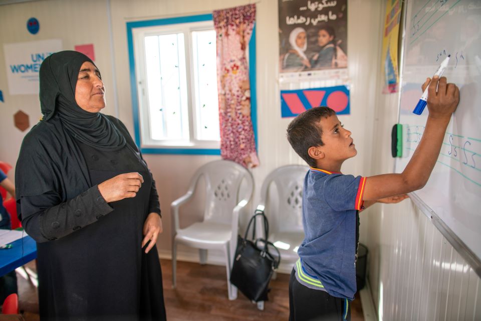 Fatima Alhaj, 50, is utilizing her passion for teaching at the UN Women Oasis to empower children and women to succeed. Photo: UN Women/Lauren Rooney