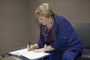 UN Women Executive Director Michelle Bachelet signs the MoU between UN Women and the Latin American Development