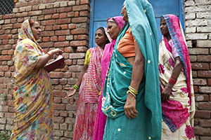 Savita Sharma, one of six human rights defenders trained by UN Women, speaks to widows on 17 June, 2013 in Vrindavan, India. Thanks to her work, 62 widows recently received their widows’ pension.