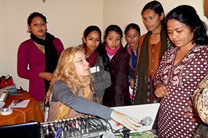 Bianca Miglioretto explains studio operation to Nepalese women community radio broadcasters during the training “Empowering Women Through Community Radio” by AMARC-WIN in Kathmandu, 2011. Some of the participants never had a chance to operate a mixing console and were eager to do so, hands-on. Photo credit: Usha/K.C. of ACORAB-CIN