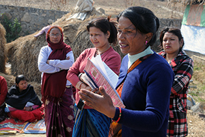 Kalpana Giri speaks with women migrant workers during a field visit to Satungal, Nepal.