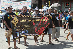 Street dwellers march for an end to violence against women as part of the Hibiscus Festival parade, August 2013. Photo: Foundation of the Peoples of the South Pacific International
