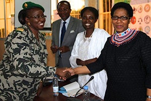 Executive Director Phumzile Mlambo-Ngcuka greets a Malian MP at Women’s Platform. The leaders asked for UN Women's continued intervention in Mali to train security forces on human rights and the prevention of gender-based violence Photo: UN Women/Mariam Kamara