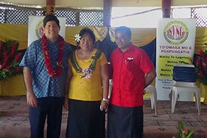 Lina Chang, President of Samoa Victim Support Group (centre), is flanked by representatives of two telecommunications companies, BlueSky and Digicel, at the launch of the help-line in April 2013. Photo: SVSG