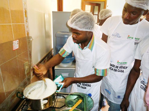 An innovative programme by UN Women in Mozambique puts men in the kitchen to experience first hand how to break free of gender stereotypes. They also reflect on violent behavior—and how to stop it. Photo courtesy of HOPEM