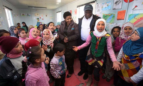 UN Women Executive Director Phumzile Mlambo-Ngcuka and UN Resident and Humanitarian Coordinator in Jordan Edward Kallon visit Zaatari refugee camp for Syrian refugees during her trip to Jordan from 20 to 23 February 2014. Photo: UN Women Jordan/Abdullah Ayoub