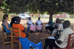 A team from UN Women meets with the Gulu Union of Women with Disabilities during a visit by the Global Manager of the UN Women Peace and Security Programme. The Union is a women-led grassroots organization that has been a beneficiary of the programme since 2011. Photo courtesy of GUWODU.