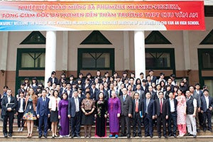 UN Women Executive Director Phumzile Mlambo-Ngcuka with Deputy Minister of the Ministry of Education and Training Nguyen Thi Nghia pose with students at Chu Van An high schoo