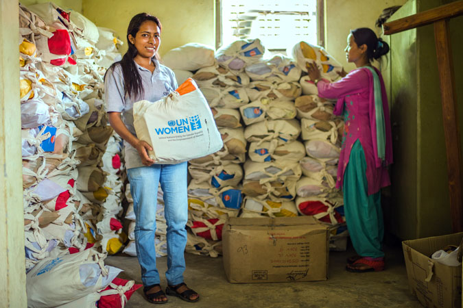 Kalpana BK with Ashmita Tamang storing dignity kit provided by UNWomen in Panchkhal on July 1, 2015