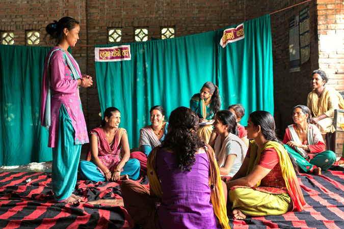 Ashmita Tamang, a psychosocial counsellor speaks during group counselling in Panchkhal, Nepal on July 1, 2015
