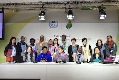 Civil society representatives at the Women’s Caucus meeting COP21. Photo: UN Women/Sharon Grobeisen.