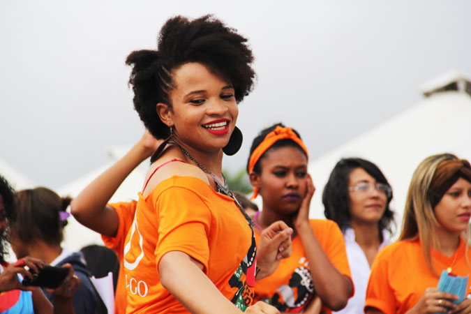 Women dressed in orange take part in the March of Black Women against Violence and Discrimination in Brazil. Photo: Photo: UNDP/Tiago Zenero