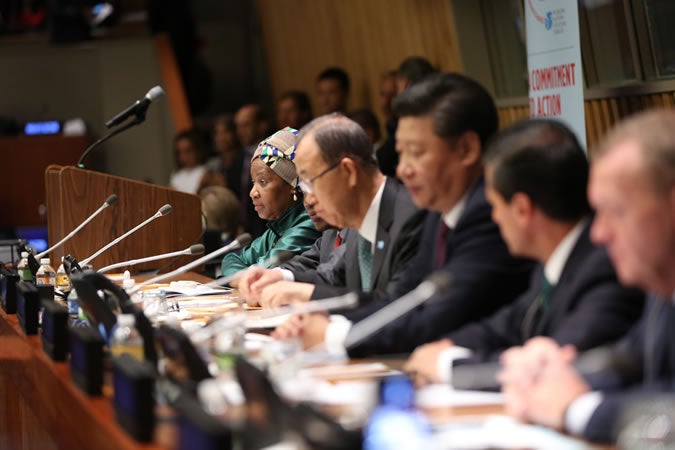 World leaders convene at the United Nations on 27 September 2015 for the “Global Leaders’ Meeting on Gender Equality and Women’s Empowerment: A Commitment to Action” to personally commit to ending discrimination against women by 2030 and announce concrete and measurable actions to kick-start rapid change in their countries. Left to right: UN Women Executive Director Phumzile Mlambo-Ngcuka (facilitator), UN Secretary-General Ban Ki-moon (co-chair) and President of the People's Republic of China Xi Jinping (co-chair). (Photo: UN Women/Ryan Brown.)