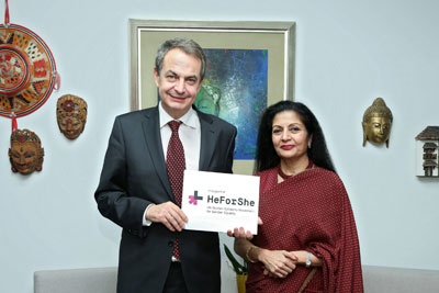 UN Women Deputy Executive Director Lakshmi Puri met with José Luis Rodriguez Zapatero, former prime minister of Spain and President of the Institute for Cultural Diplomacy Advisory Board, and placed a HeForShe pin on his lapel. Photo: UN Women/Ryan Brown