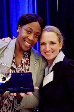 Empower Women Champion, Sharon Reed, 47, stands with Antonia "Neet" Childs, when she received the ATHENA award for women's leadership in 2014. Photo credit: Sharon Reed.