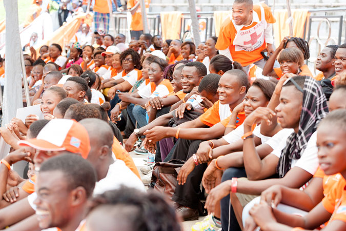 Youth participate in “orange the world” activities in Kinshasa, DRC. Photo: UN Women/Catianne Tijerina