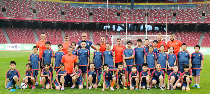 Valencia C.F with kids from the Beijing Royal School.