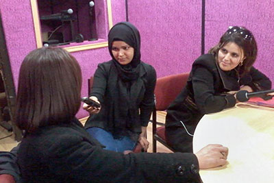 In the studio of Radio Voix de Femmes, Nafisa Lahreche hosts a talk with Ben Torki Oumsaad, MP and activist within the province of Algiers, and Kheira Bounaadja, a political activist and former official of the Department of Research and Education. Photo courtesy of Radio Voix de Femmes