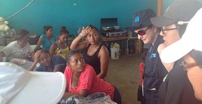 UN Women Representative in Ecuador, Moni Pizani (first on the right) visits a shelter in Pedernales. Photo: UN Women Ecuador