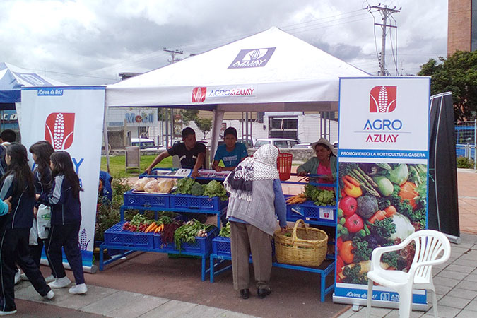 Local women like Maria Rosa Suquilanda sell their products at a local fair. Photo courtesy of the Provincial Government of Azuay.
