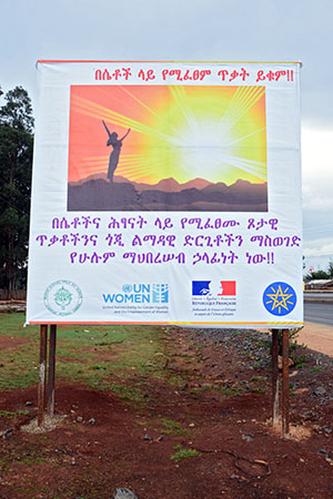 In the Amhara region, a billboard with a message about fighting violence against women and harmful traditional practices. It was produced in collaboration with the Ethiopia Orthodox Church, UN Women, Embassy of France and the Government of Ethiopia. Photo: UN Women/Paula Mata