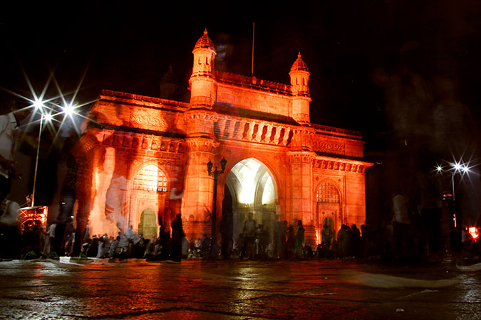 The iconic Gateway of India in Mumbai illuminated in the color of orange as part of 16 Days of Activism. Photo: UN Women/Deepak Malik
