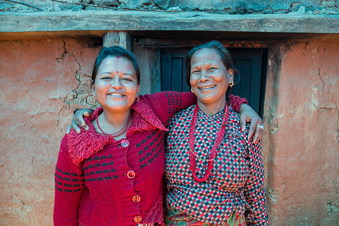 Kalpana Shrestha (left) has received psychosocial counselling for her trauma, as well as support from her mother-in-law (right), pictured here in Sanosirubari VDC -2 in Chautara, Sindhupalchwok, Nepal. Photo: UN Women/N. Shrestha