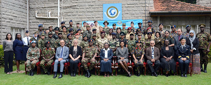 (From fourth Left – Right) Counsellor, Gender and Governance at Ministry for Foreign Affairs of Finland, Ms. Riikka Raatikainen; Director of International Peace Support Training Center (IPSTC), Brigadier Patrick Nderitu; Kenya’s Ministry of Defence Policy and Strategic Planning Director, Ms. Alice Kiarie; UN Women Country Director, Ms. Zebib Kavuma; along with facilitators and participants during the fifth edition of Female Military Officers course. Photo: UN Women/Kennedy Okoth