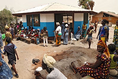 The Peace Huts are a safe space where women of the village come together to mediate and resolve community disputes. Photo: UN Women/Stephanie Raison