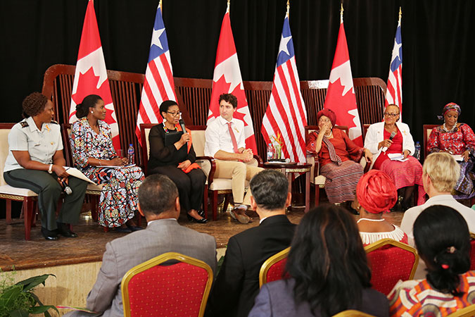 UN Women Executive Director at a high-level panel on the empowerment and leadership of women and girls, alongside Liberian President Ellen Johnson Sirleaf and Canadian Prime Minister Justin Trudeau. Photo: UN Women/Winston Daryoue