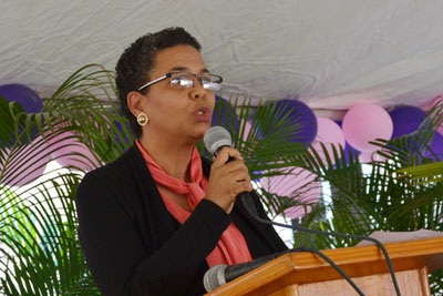 Nadege Beauvil speaking at an International Women's Day event on 8 March 2016, before a group of government and civil society partners. Photo: UN Women/Alide Andral 