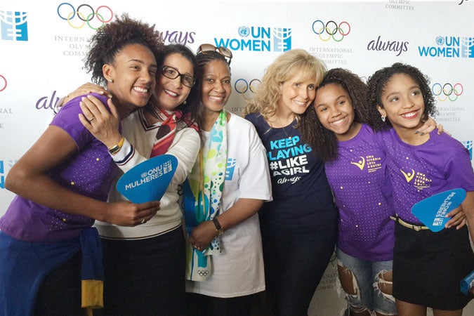 L-R:  Marcelly Vitória de Mendonça, 16, handball, ‘One Win Leads to Another’ participant; Nawal El Moutawake, Vice-President, International Olympic Committee (IOC); Phumzile Mlambo-Ngcuka, UN Women Executive Director; Juliana Azevedo, Vice President of Procter & Gamble; Kaillana de Oliveira Donato, 14, basketball, ‘One Win Leads to Another’ participant; Adrielle Alexandre da Silva, 12, ballet and rhythmic gymnastics, ‘One Win Leads to Another’ participant. Photo: UN Women/Beatrice Frey