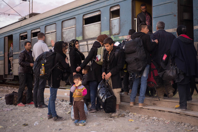 Refugees getting ready for the train in Gevgelija to travel to the border with Serbia, photo credit: Mirjana Nedeva