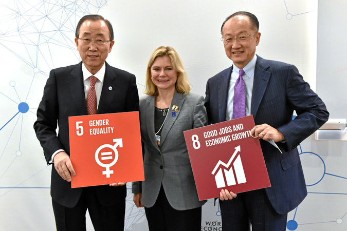 UN Secretary-General Ban Ki-moon, UK International Development Secretary Justine Greening, and World Bank Group President Jim Yong Kim hold up visual icons for a couple of the new Sustainable Development Goals. Photo: swiss-image.ch/Michael Buholzer