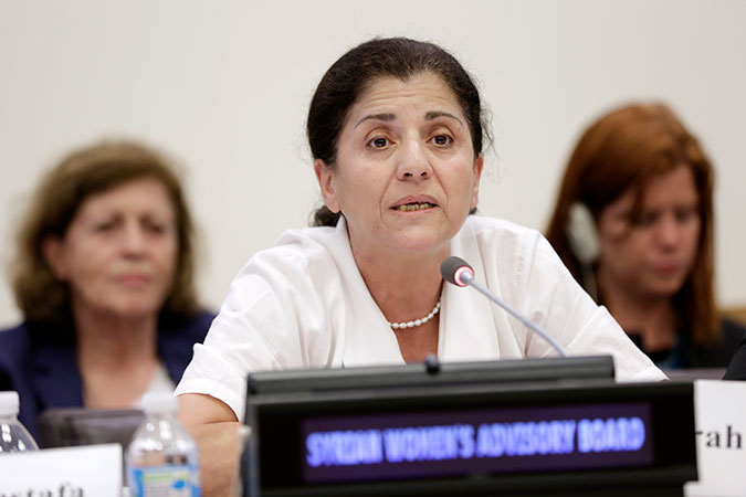 Syrian Women's Advisory Board member Monira Hwaijeh speaks at the UN Women organized panel discussion. Photo: UN Women/Ryan Brown
