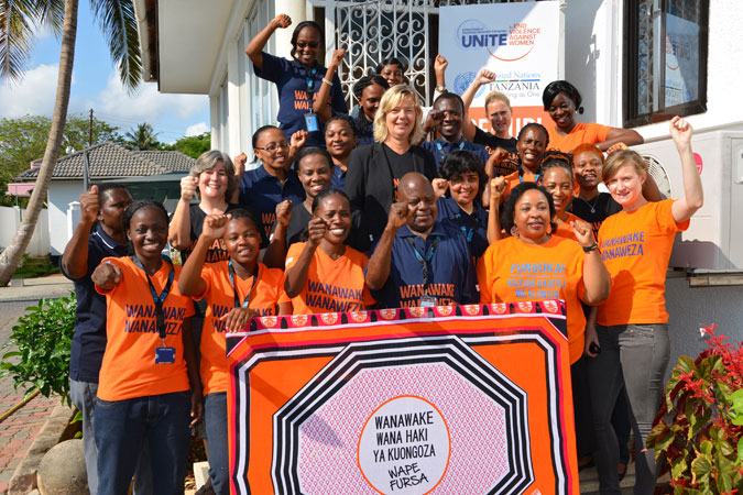 UN Women Tanzania Country Office colleagues wearing orange for the UNiTE Campaign’s orange day event to promote preventing violence against women during elections, in October 2015 on the eve of the general elections. Photo: UN Women Tanzania/Beatrice Frey