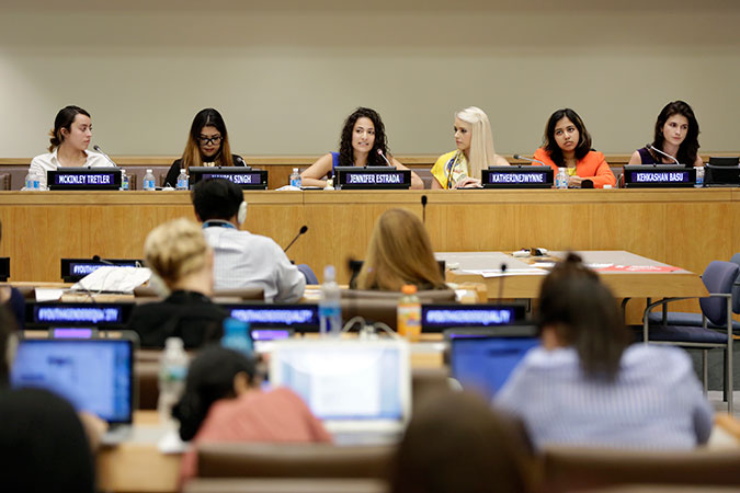 The second panel of the event includes, from left to right: McKinley Tretler, Digital Associate, Malala Fund; Monica Singh, Founder and President, Mahindra Singh Foundation; Jennifer Estrada, Campaign Director, HerStory (pictured speaking); Katherine J Wynne, Co-Director, CANOE; Kehkashan Basu, Global Coordinator for Children and Youth, UNEP; Jennifer Caplan, Program and Development Officer, Rainforest Fund.