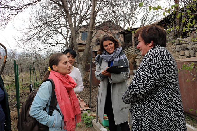 Catherine Wolf and Zabel Hayruni of Green Lane, talking to beneficiaries in the community of Ashotavan. Photo: Green Lane/Armen Sarukhanyan