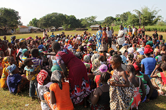 A whole village in Sierra Leone comes together to speak out against Female Genital Mutilation. Photo: UN Women/Cecil Nelson