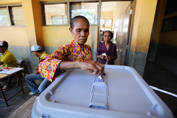 A woman votes in the presidential elections, Timor-Leste. Photo: UN Photo: Bernadino Soares