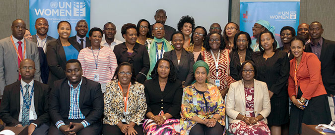 Phumzile Mlambo-Ngcuka, Executive Director of UN Women poses for a picture with various UN Women partners in Rwanda. Photo: UN Women/Franz Stapelberg
