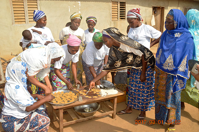 Women in the Lougba group, Benin, making soy biscuits. Photo: ANAF Benin