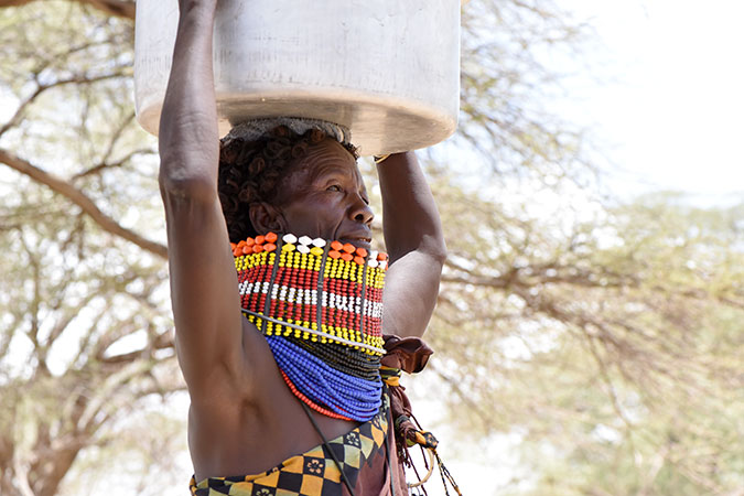 Paulina Epung'u collects water in Turkana county. Photo: UN Women/Kennedy Okoth