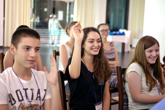 Young students participate in open forums with women candidates at the public forum in Durres, Albania. Photo: UN Women/Violana Murataj