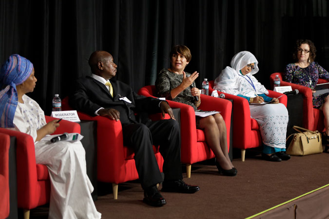 UN Women Executive Director Phumzile Mlambo Ngcuka; President of Uganda, Yoweri Museveni; Netherlands Minister of Foreign Trade and Development Cooperation, Lianne Plouman; and UNFPA Deputy Executive Director, Laure Londen participate in a panel discussion on ending child marriage in Africa. Photo: UN Women/Ryan Brown
