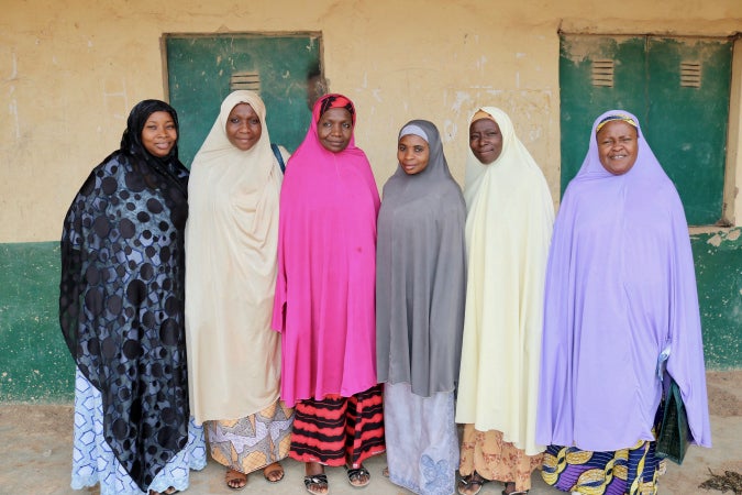 Maijidda Garba (right), leader of the Angwan Rogo peace network, with members. Photo: UN Women/Ladi Eguche