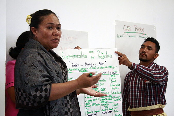 Participants at the Tonga National Gender and Protection in Humanitarian Action Training present groupwork on the importance of communication during emergencies, Tonga, 2016. Photo: UN Women/Lauretta Ah Sam